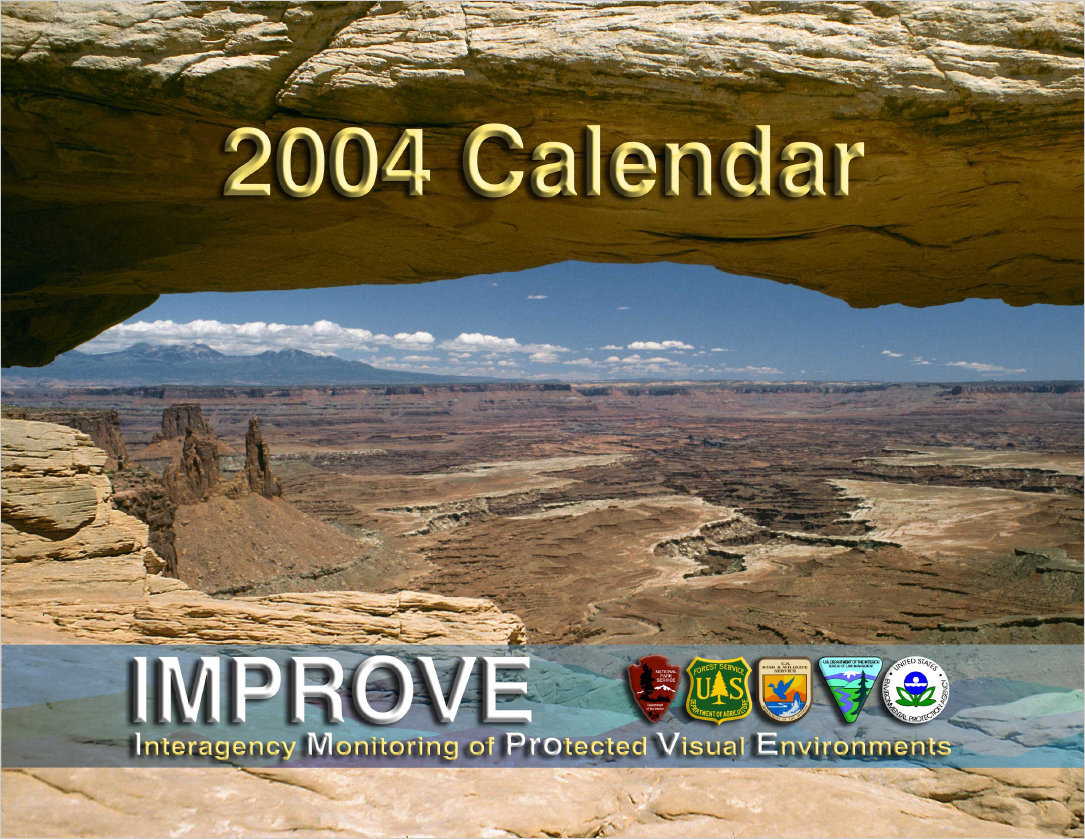 Image: photo of rock formation arch looking out over a desert landscape.