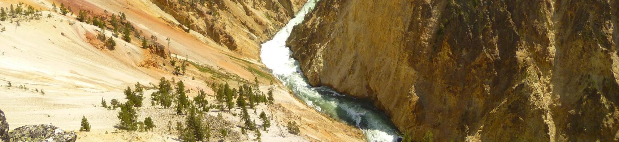 Image: the rapid Yellowstone River cuts through mountainous terrain to form a canyon. Photo credit Josh Grant of AQRC.