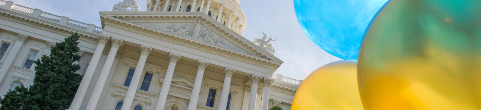 Image: balloons in front of the Sacramento, CA Capitol building. Photo by: Karin Higgins/UC Davis.